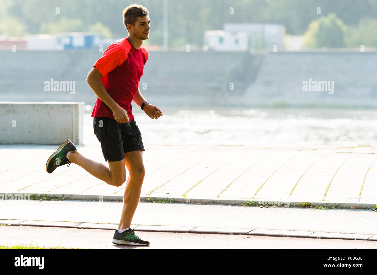 Sporty young man training hi-res stock photography and images - Alamy
