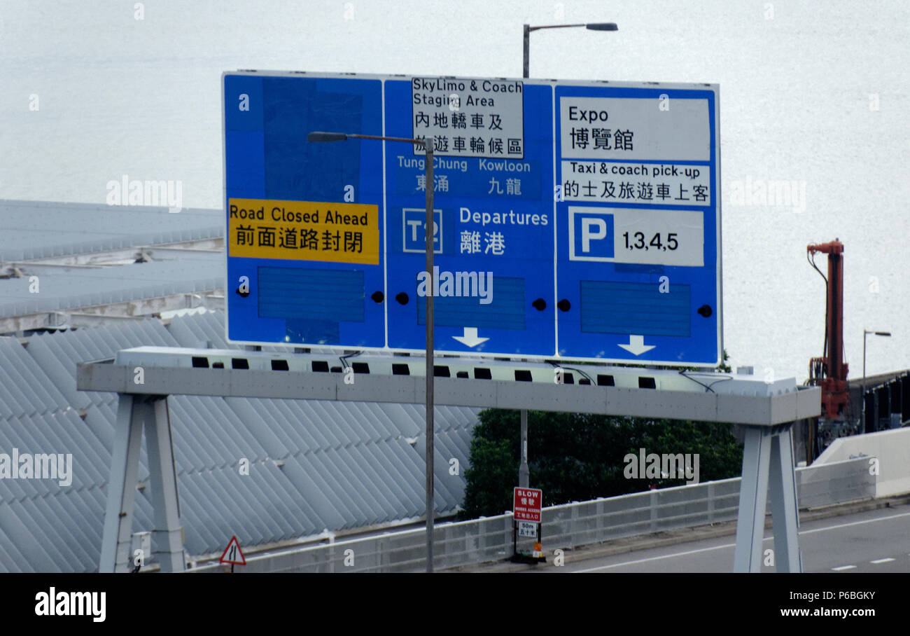 Directions To Terminal 2 Road Sign Giving Directions To Terminal 2, Taxi And Coach Pick Up, Hong  Kong Expo In English & Chinese, Chek Lap Kok Airport, Hong Kong  International Stock Photo - Alamy