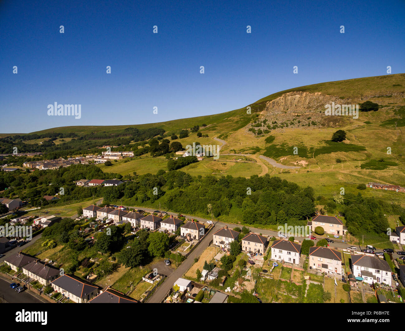 Aerial overhead view of houses in the Welsh Valley of Blaenau Gwent