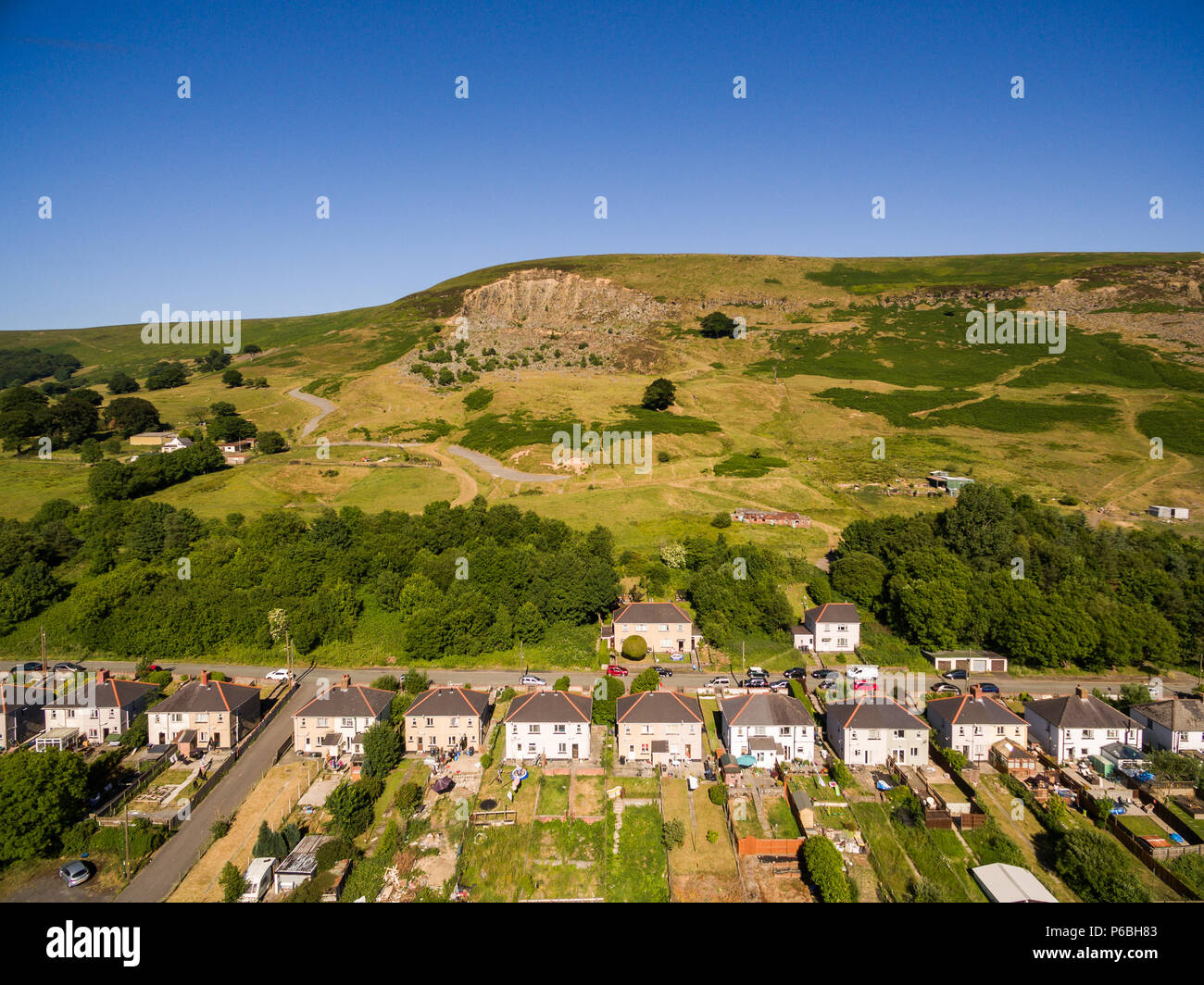 Aerial overhead view of houses in the Welsh Valley of Blaenau Gwent