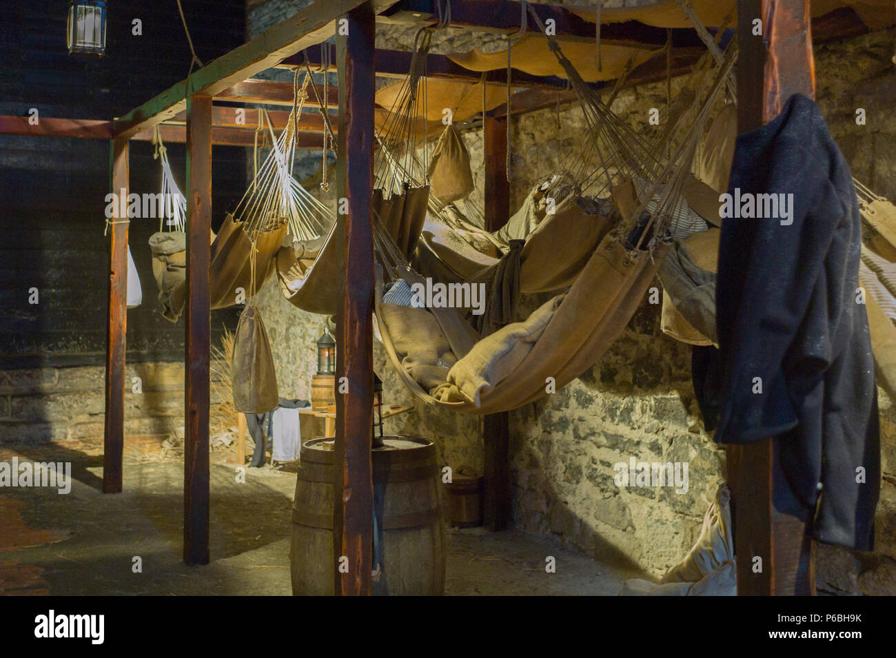 Hammocks hanging in the prison inside Edinburgh Castle used by prisoners of war. Scotland Stock Photo