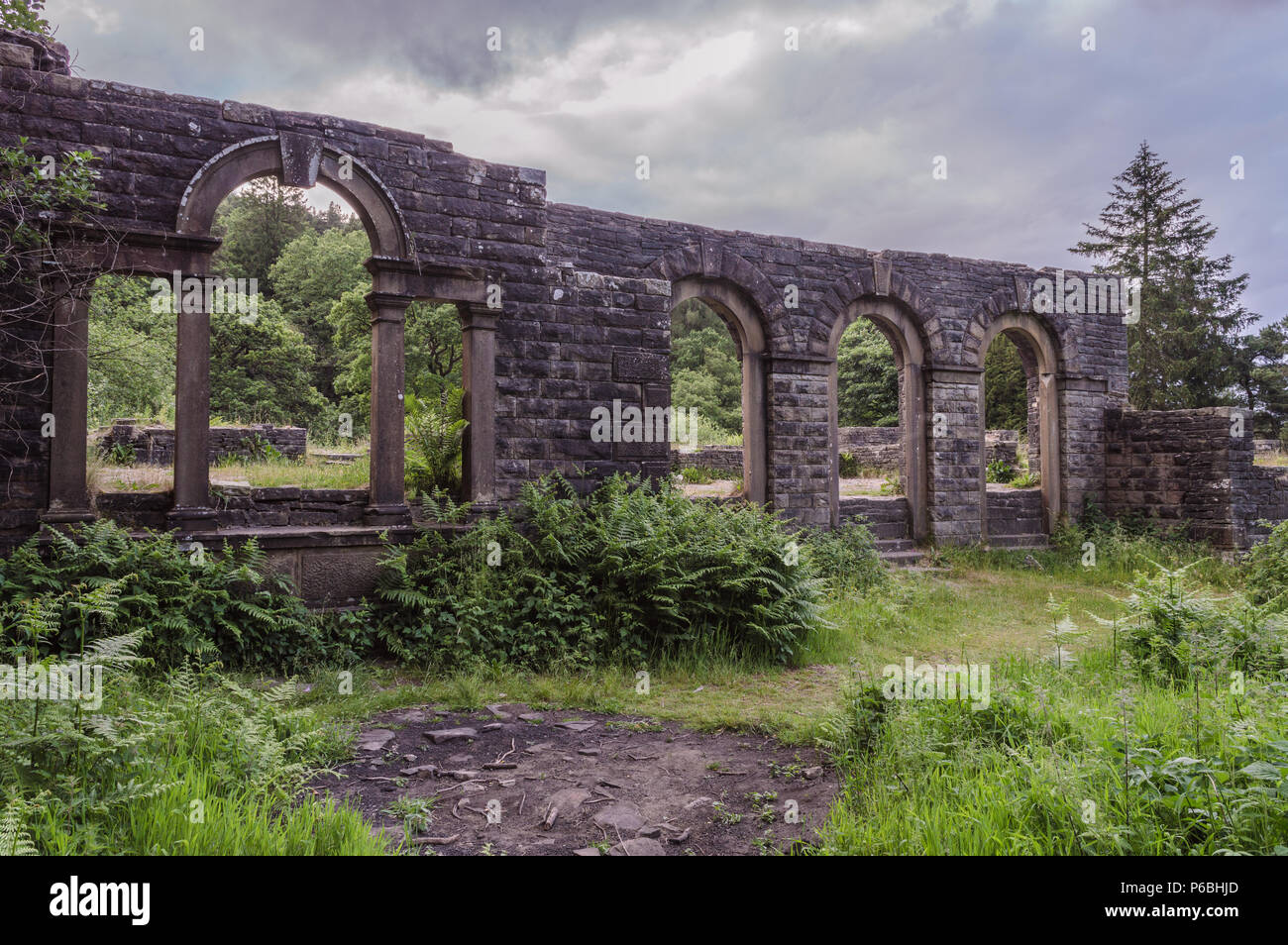 The ruins of Errwood Hall at Goyt valley within the Peak District National park. Stock Photo