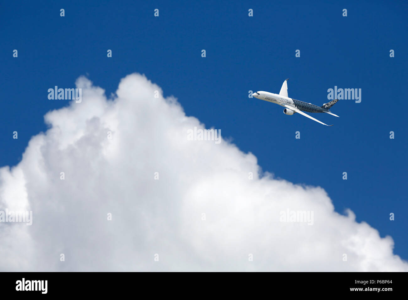 Seine et Marne. AIRBUS A350 passing in the sky Stock Photo - Alamy