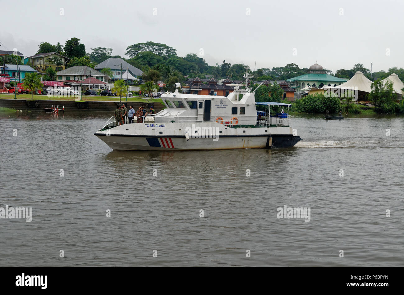 River police boat on the Sarawak River in preparation for the Gawai Parade, Kuching, Malaysia, Borneo Stock Photo