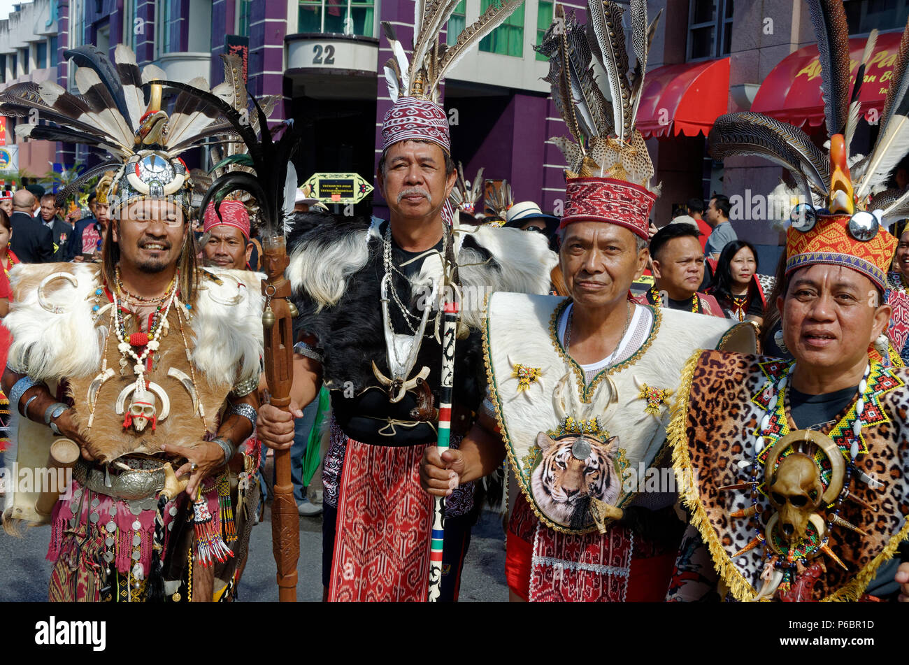 Iban men in traditional dress, Gawai festival, Kuching, Borneo, Sarawak, Malaysia Stock Photo