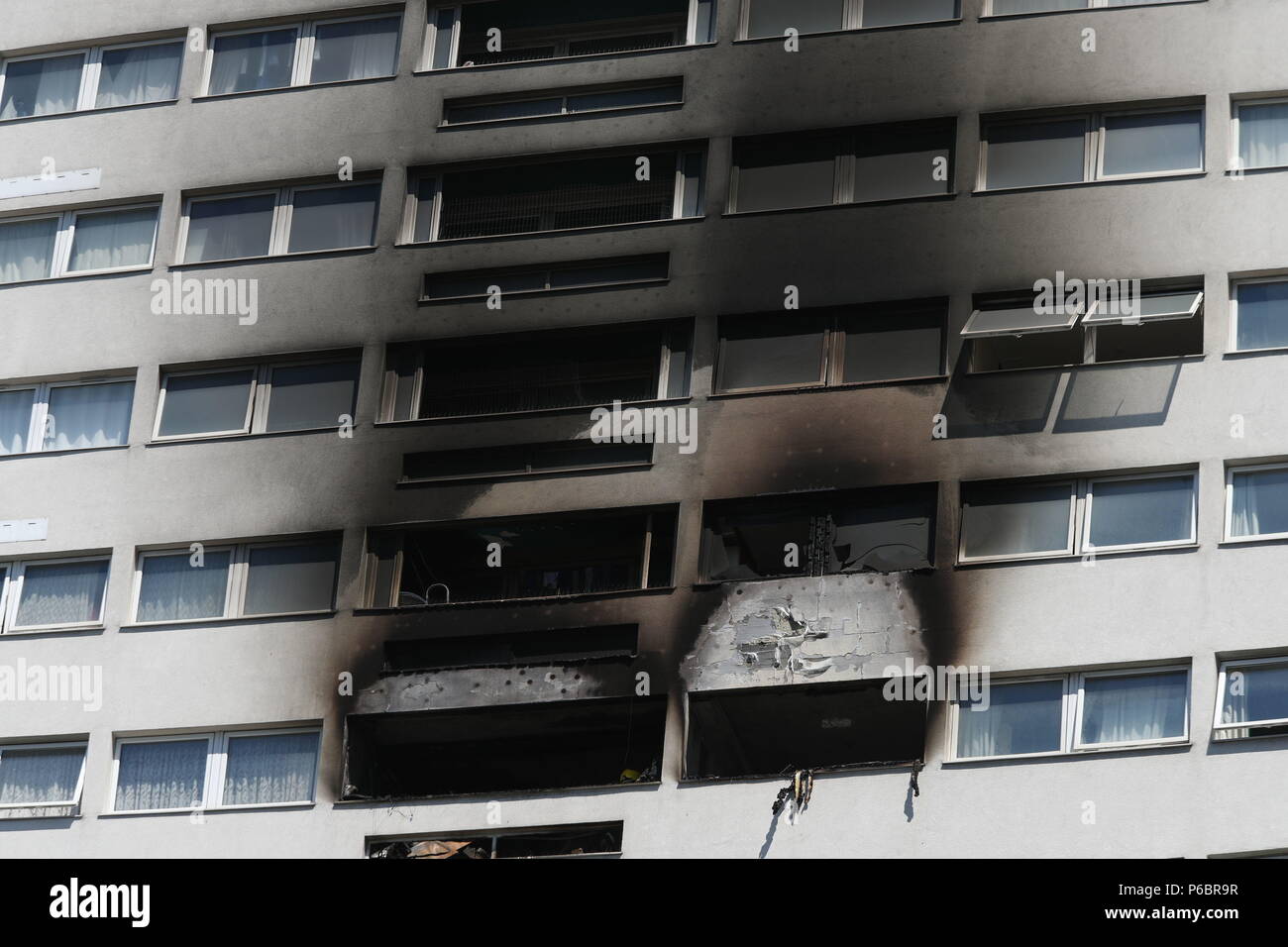 Damage to the outside of a high-rise block in Wellington Way, Mile End, in east London, after a fire broke-out in a 12th floor flat. Stock Photo