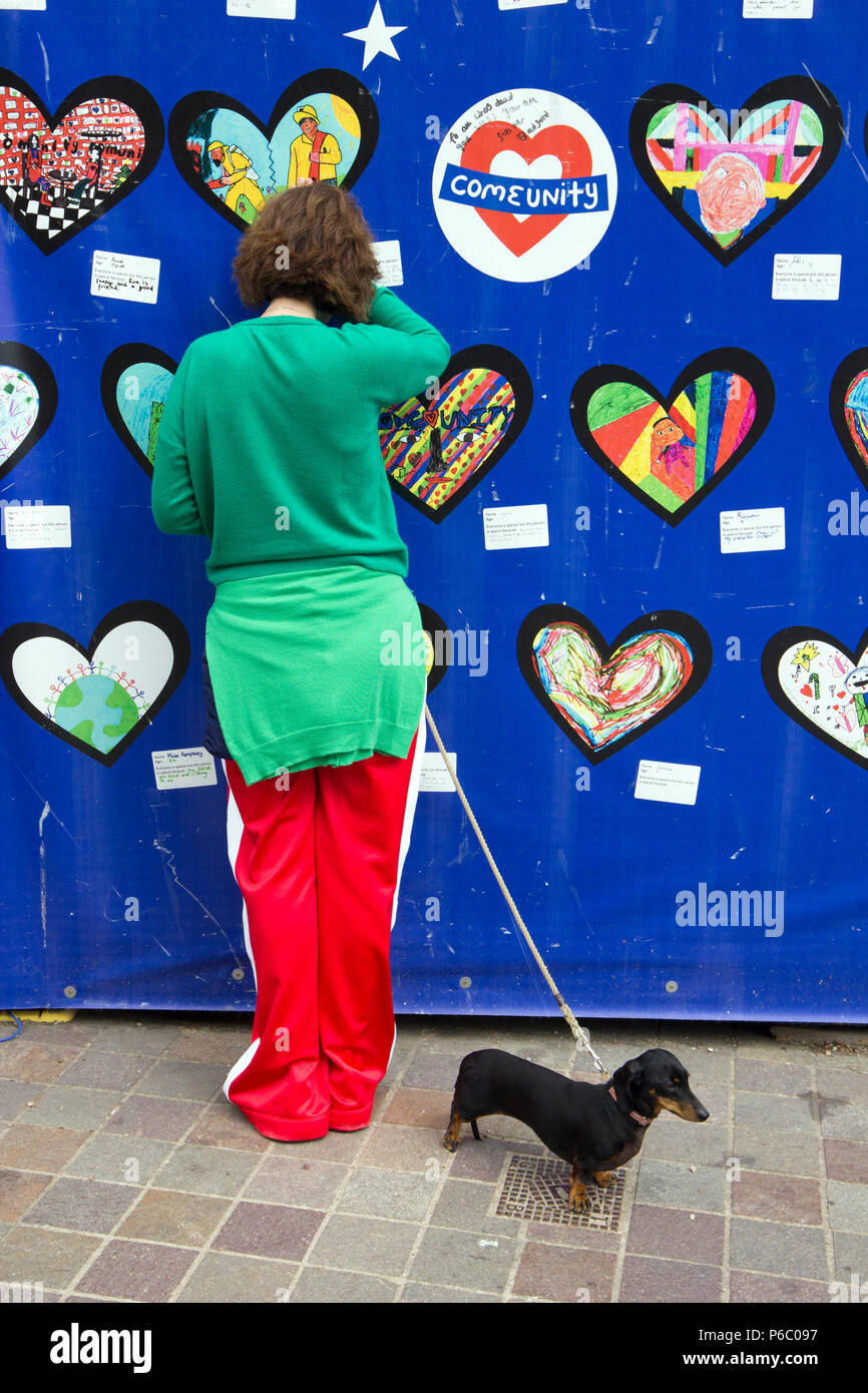 The first anniversary of the Grenfell Tower fire which claimed 72 lives. Memorial wall, South Kensington, London, UK, 14th June 2018. Stock Photo