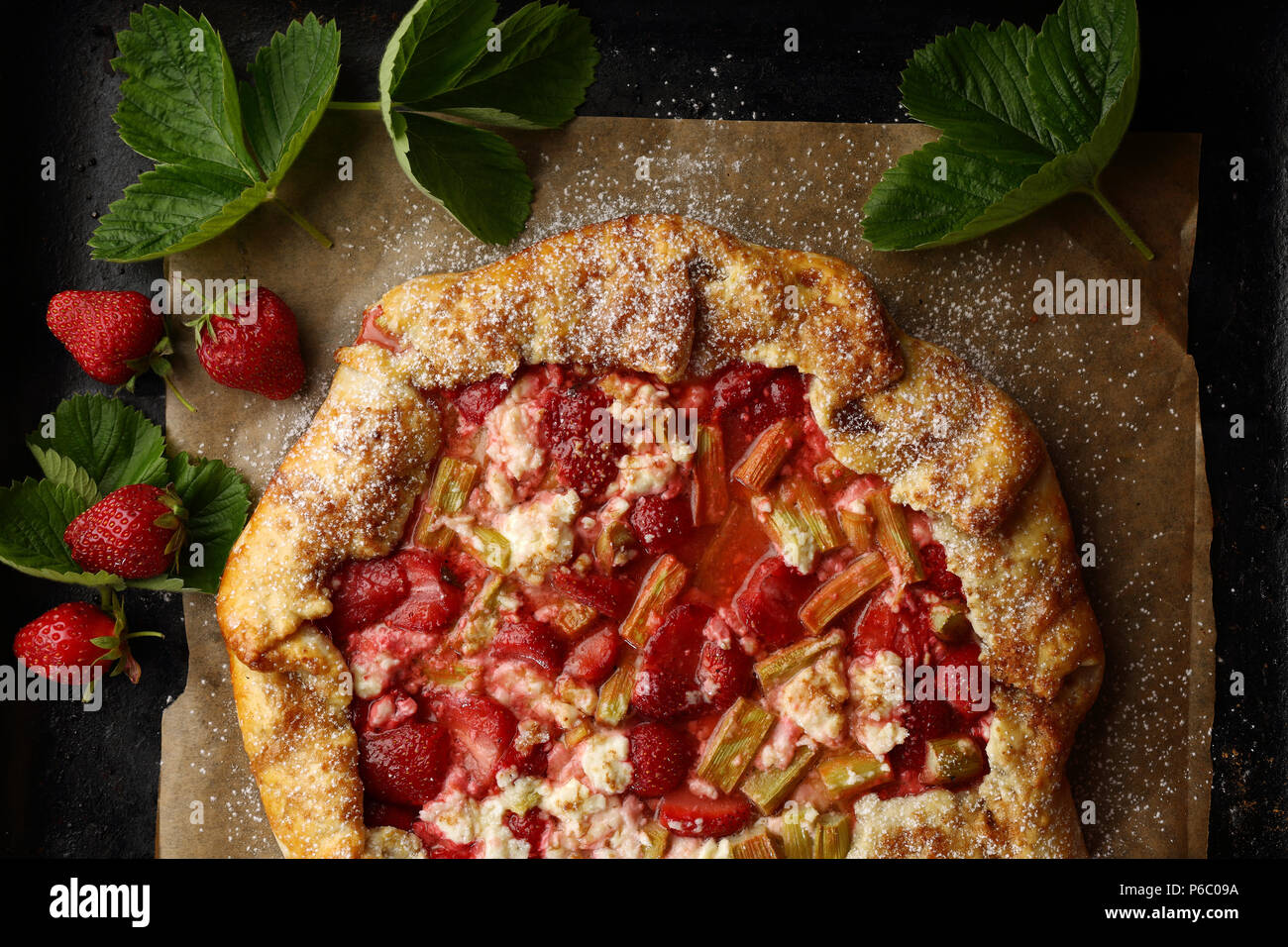 Strawberry and rhubarb galette Stock Photo - Alamy