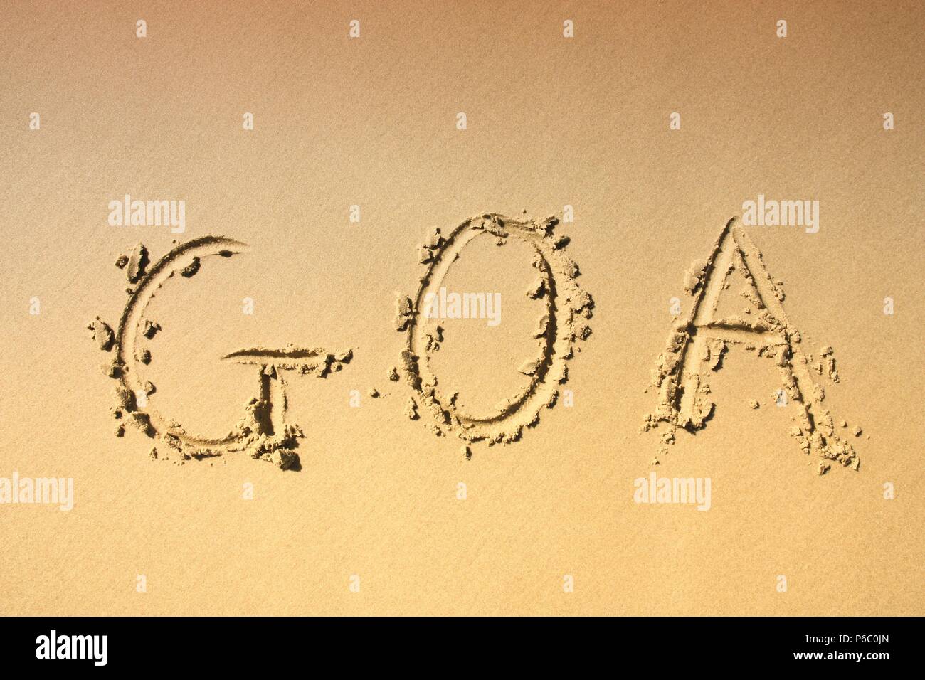 Beach in Goa, India - finger writing in wet send Stock Photo - Alamy