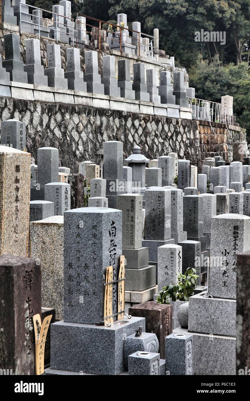 KYOTO, JAPAN - APRIL 19, 2012: Higashi Otani cemetery in Kyoto, Japan. It exists since 1671 and is one of most important cemeteries in Japan. Stock Photo