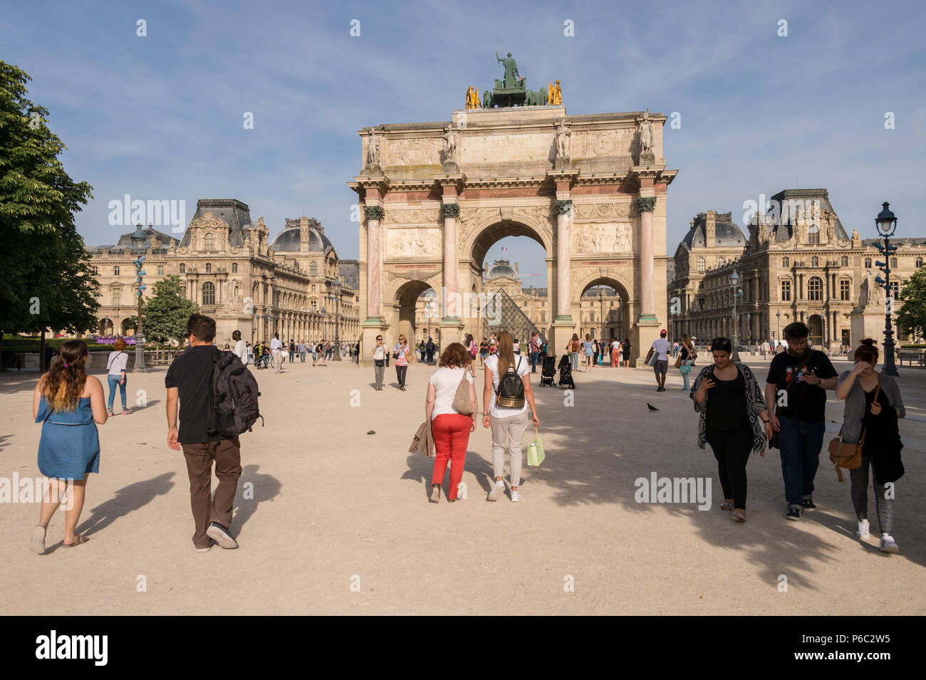 Paris, France - 24 June 2018: Carrousel Arc de Triomphe, Louvre Museum and Pyramid Stock Photo