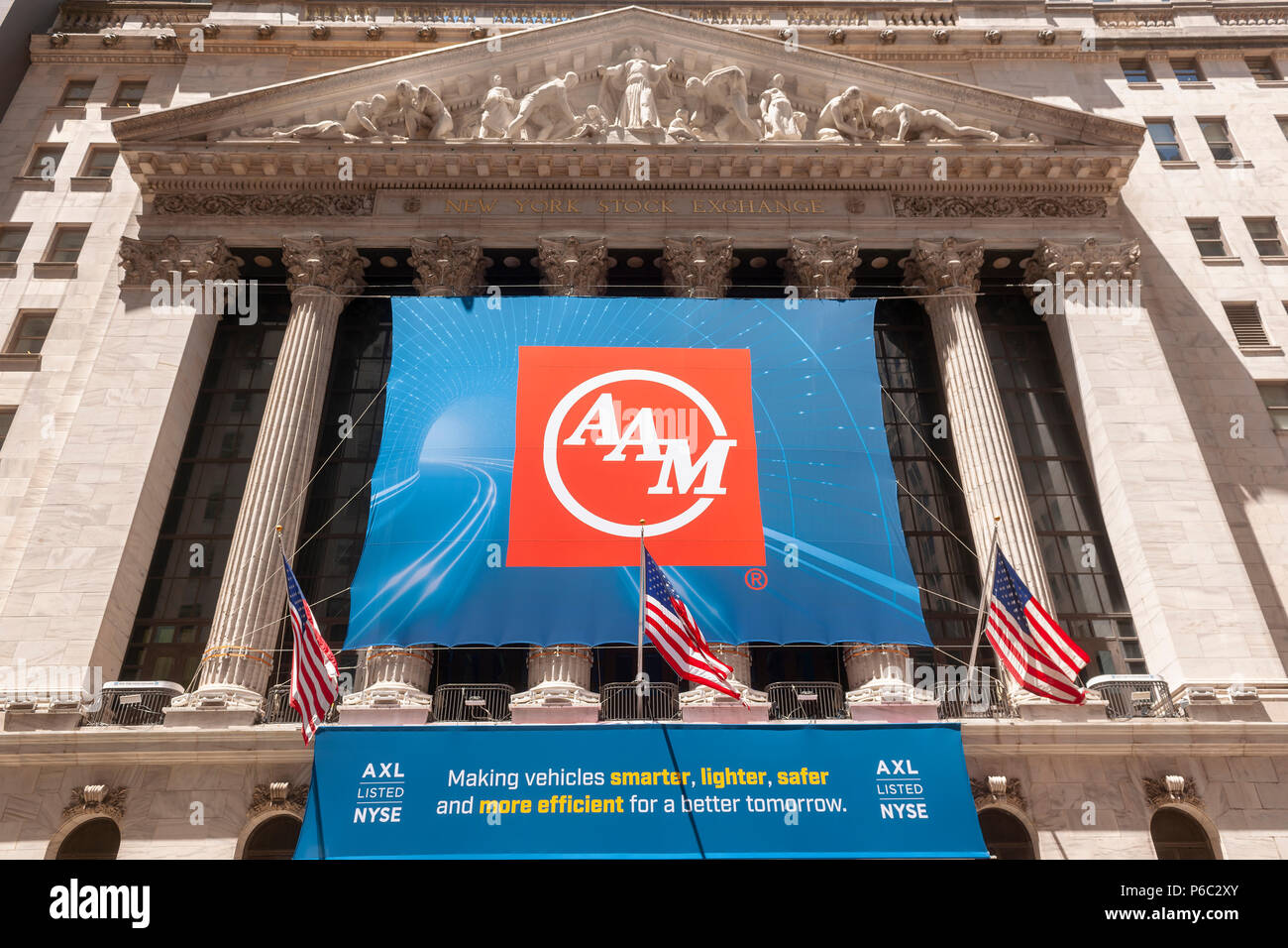 The New York Stock Exchange in Lower Manhattan in New York on Thursday, June 14, 2018 is decorated with a banner for American Axle & Manufacturing Holdings (AAM) in honor of their investor day and ringing the closing bell. (Â© Richard B. Levine) Stock Photo