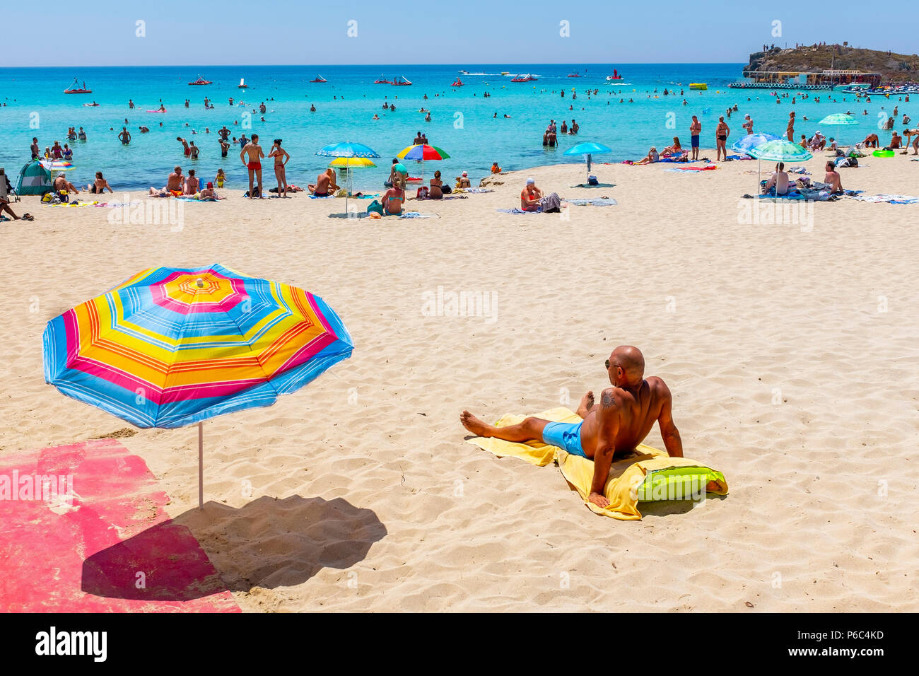 Tourists on the beach at Nissi Bay, Nissi Beach, near Ayia Napa, Cyprus  Stock Photo - Alamy
