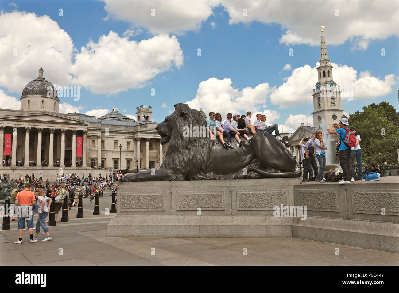 Tourist in Trafalgar Square, London, England Stock Photo