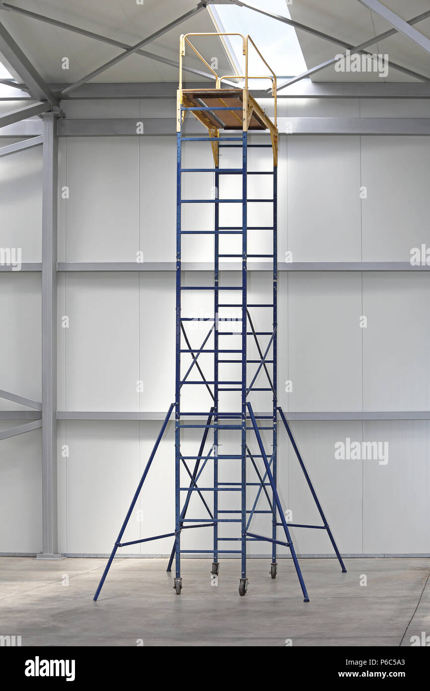 Mobile Scaffold Tower Platform in Distribution Warehouse Stock Photo