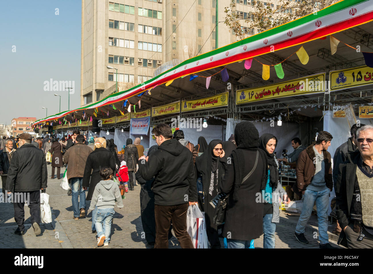 A mid day street scene at a popular food festival market in Tehran, Iran. Stock Photo