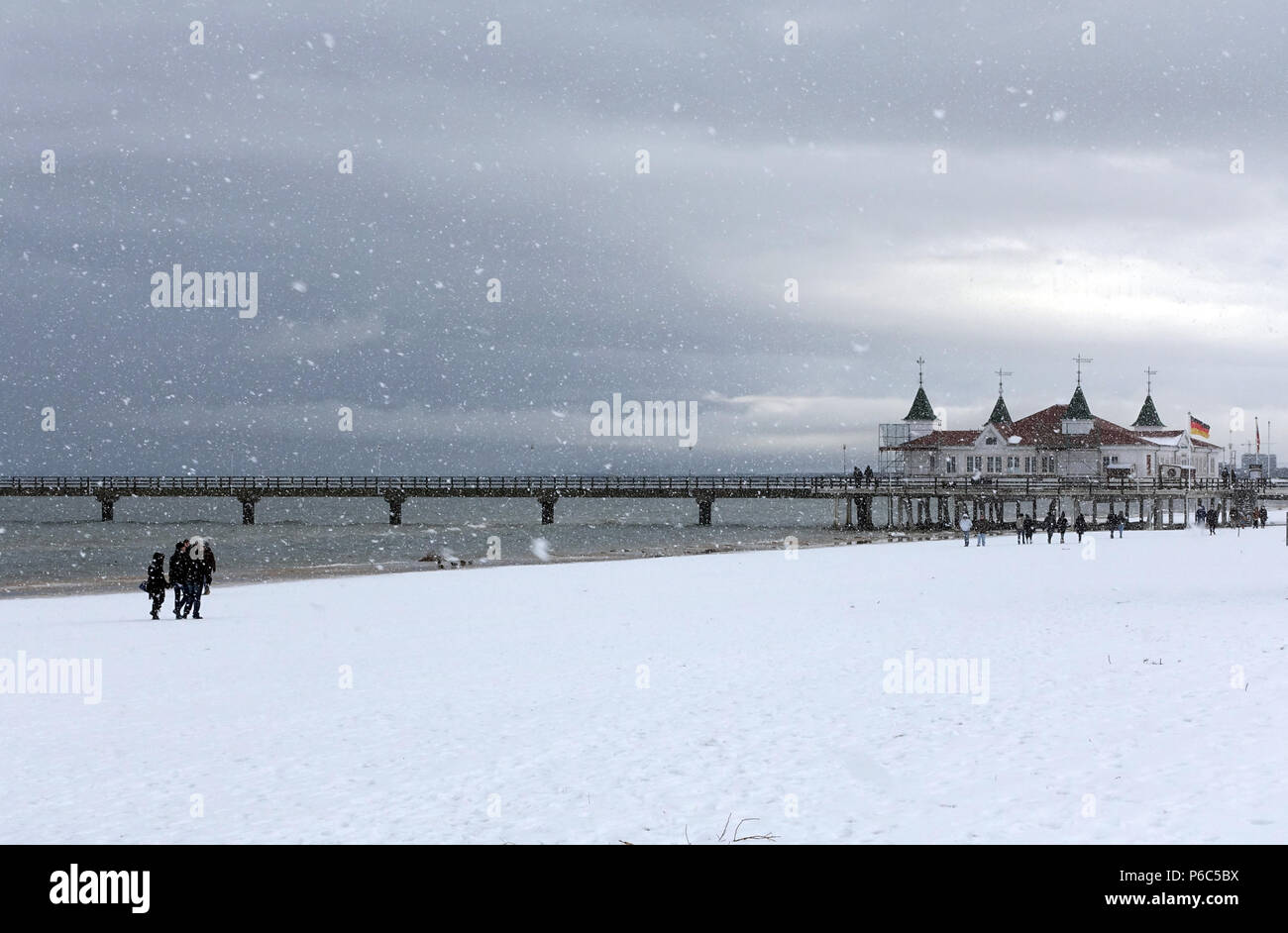 Ahlbeck, Germany, view of the sea bridge in winter in snowfall Stock Photo