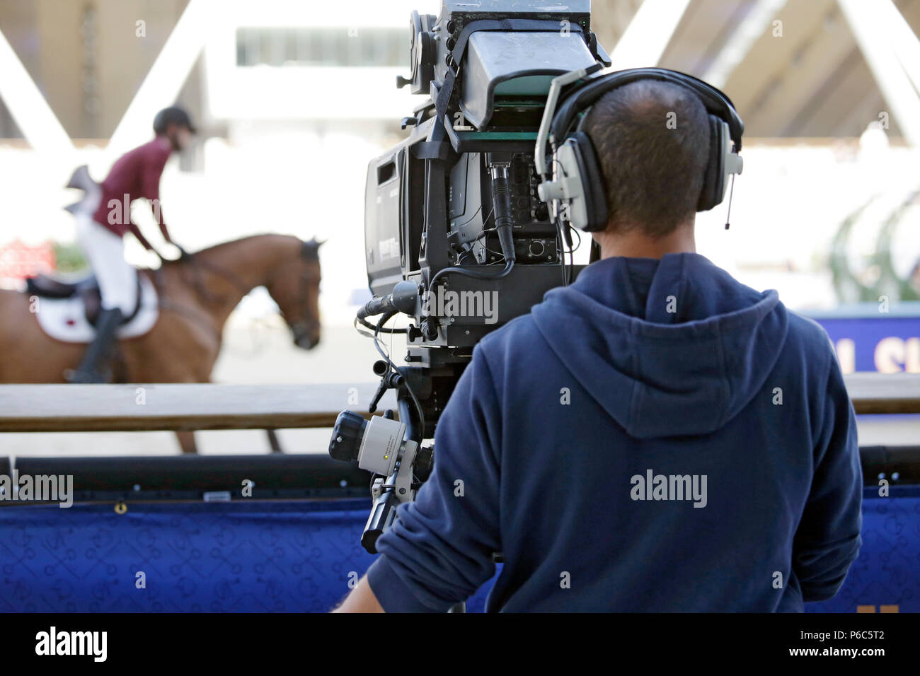 Doha, cameraman at work on a jumping tournament Stock Photo