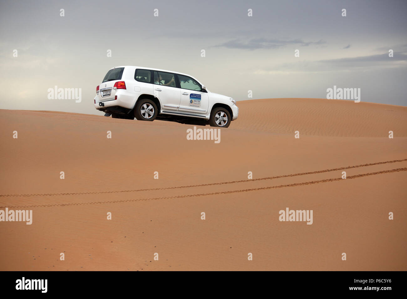 Dubai, United Arab Emirates, Jeep in the desert Stock Photo
