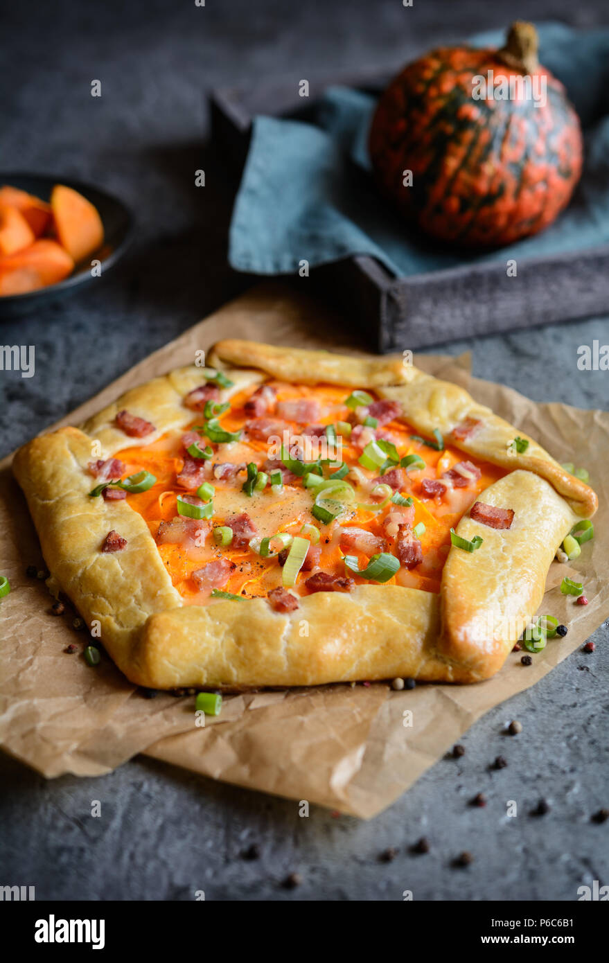 Savory pumpkin Galette with bacon, cheese and green onion Stock Photo Alamy