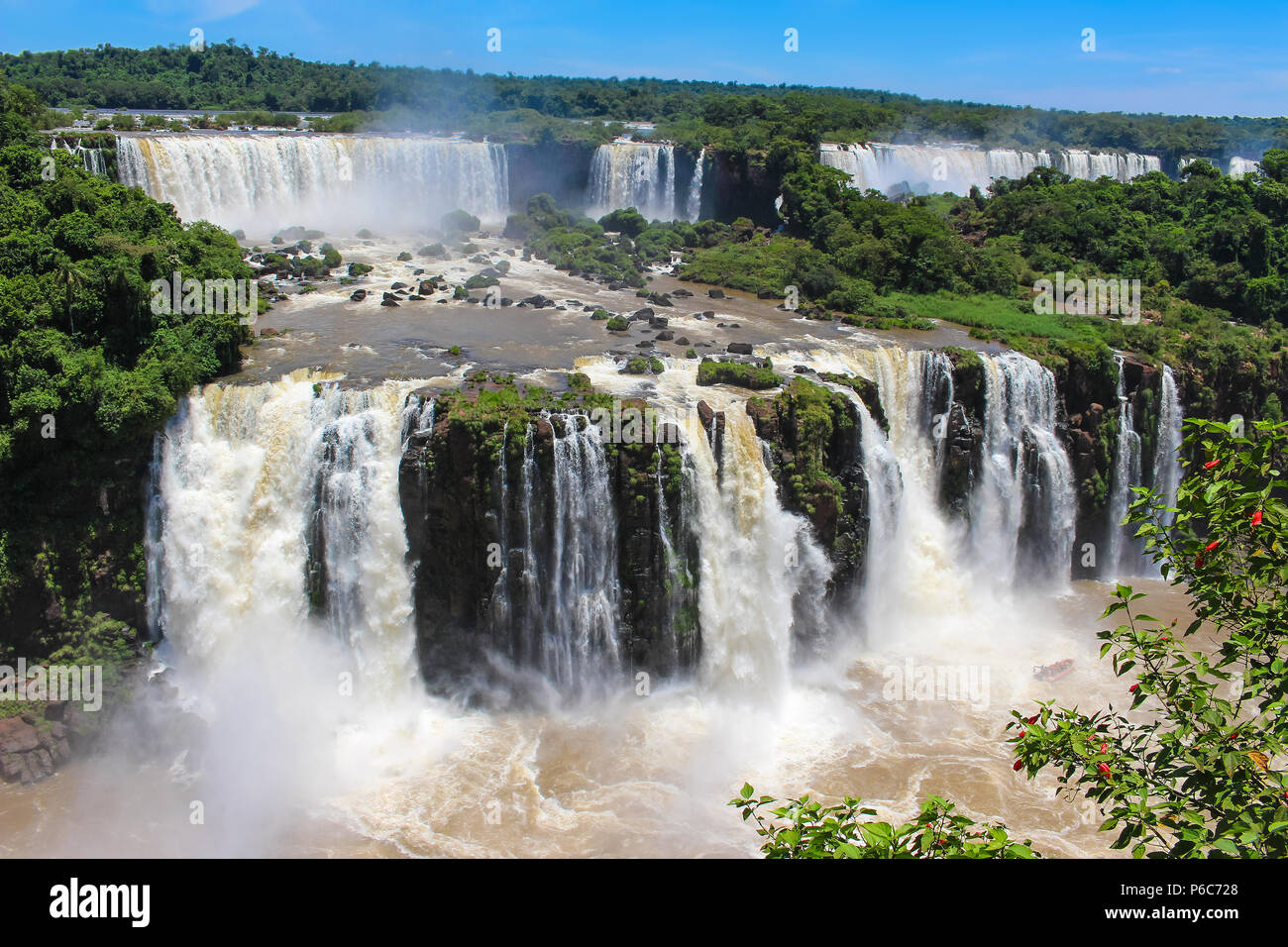 Iguazu Falls or Iguaçu Falls are waterfalls of the Iguazu River on the border of the Argentine province of Misiones and the Brazilian state of Parana, Stock Photo