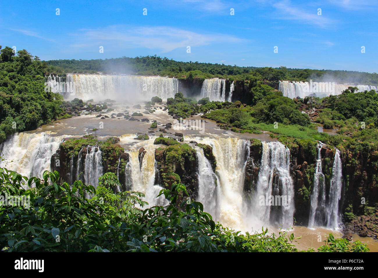 Iguazu Falls or Iguaçu Falls are waterfalls of the Iguazu River on the border of the Argentine province of Misiones and the Brazilian state of Parana, Stock Photo