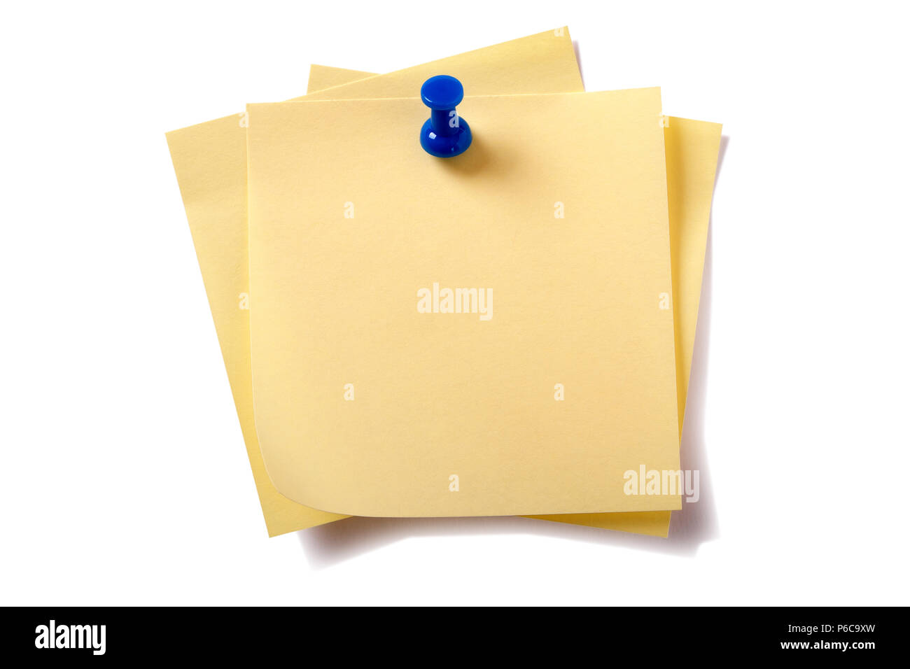 Untidy pinned stack yellow sticky post notes isolated on white Stock Photo