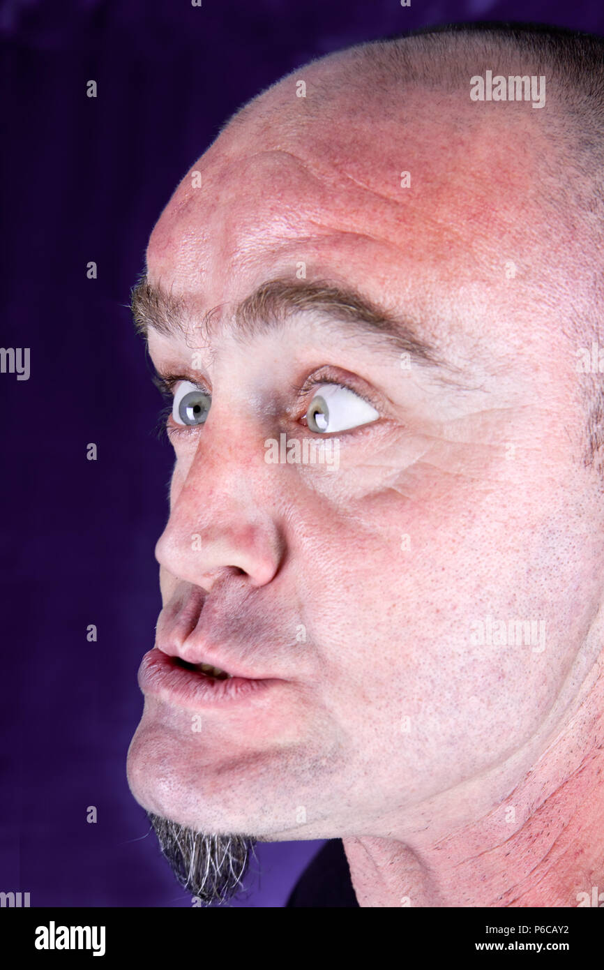Outraged Eyefested Absolutely shocked and outraged guy, studio shot Stock Photo - Alamy