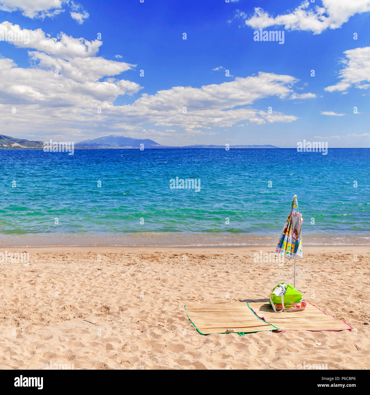 Summer concept beach with cloudy sky Stock Photo - Alamy