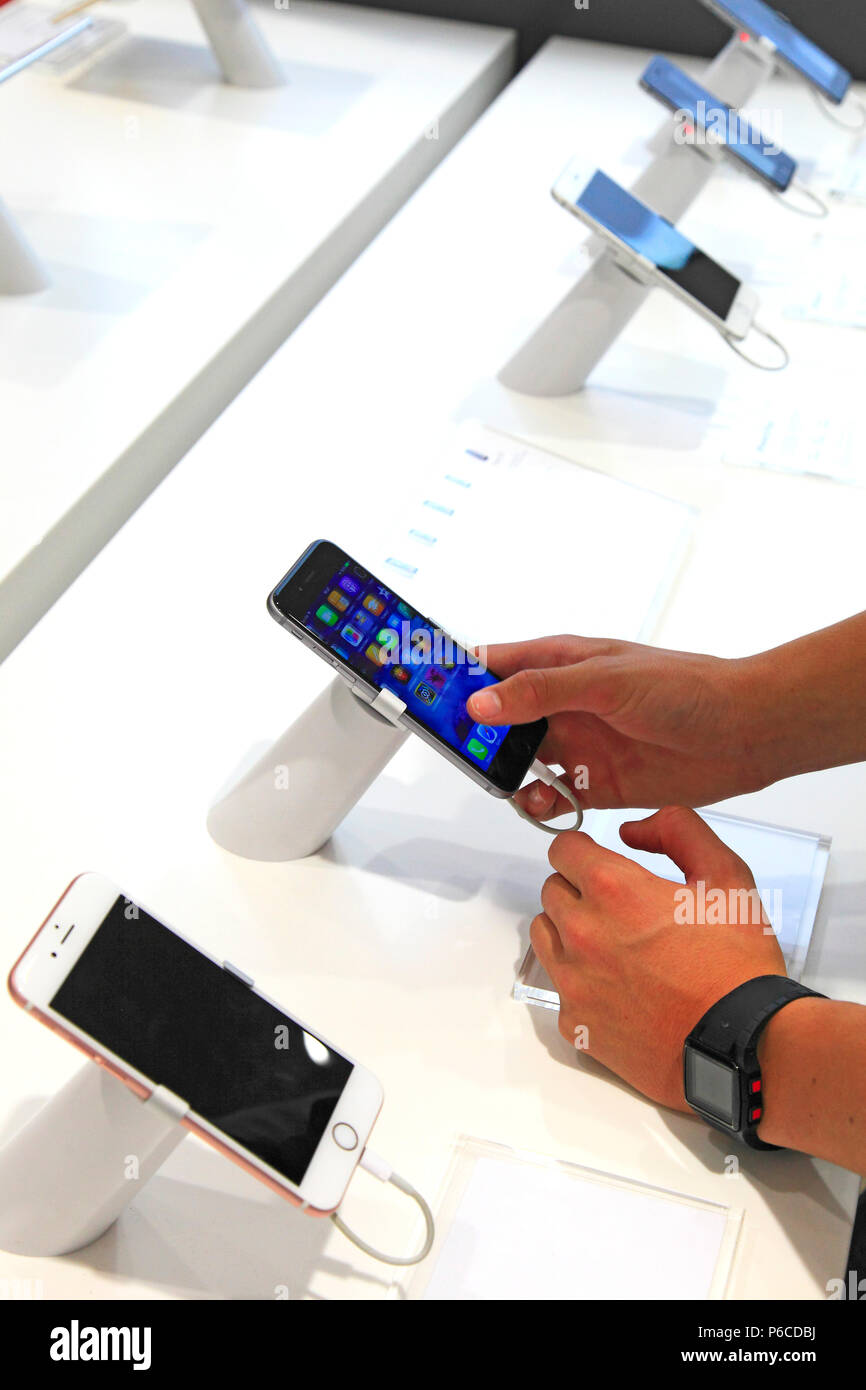 Smartphone in supermarket Stock Photo - Alamy