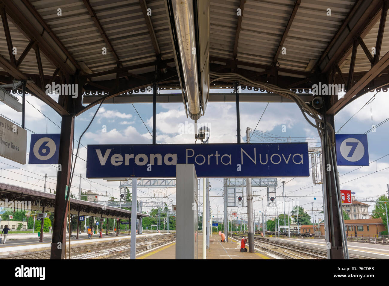 Verona, Italy train station platform. Porta Nuova main railway station with  sign, tracks and platform view Stock Photo - Alamy