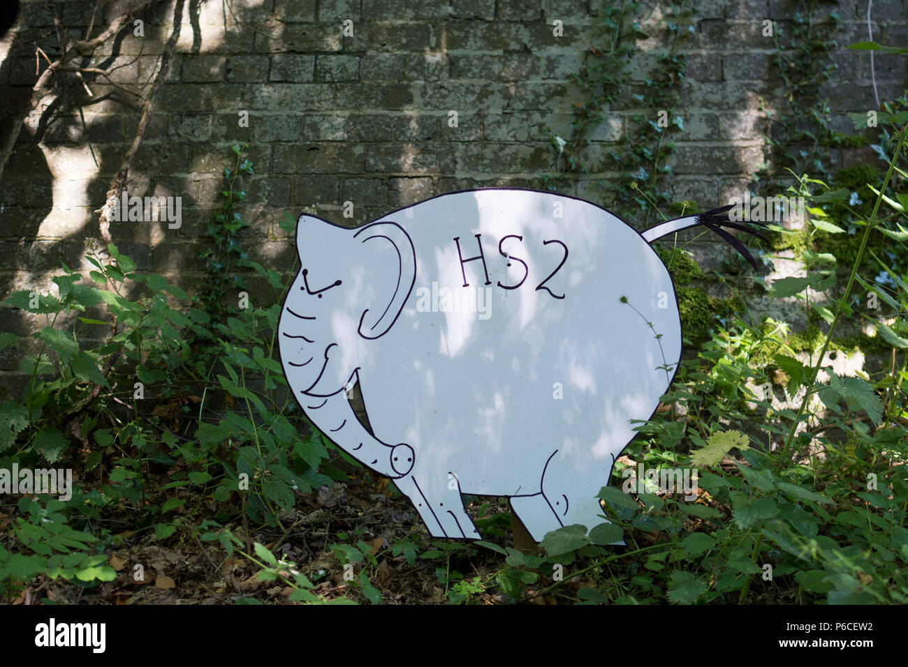 HS2 white elephant sign on The Greenway at Burton Green, Warwickshire, England, UK Stock Photo
