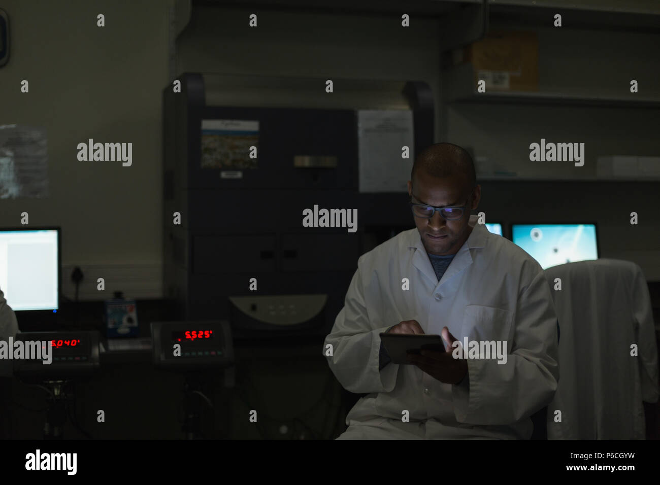 Scientist using digital tablet Stock Photo