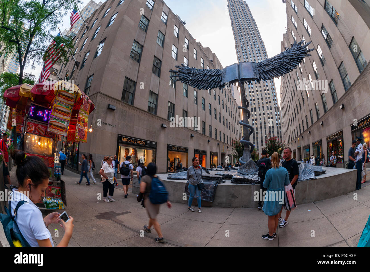 'Uraeus' by the artist Anselm Kiefer on display at Rockefeller Center in New York on Tuesday, June 26, 2018. The artwork, named for the cobra that symbolizes the Egyptian goddess Wadjet is 20 feet tall, with a wingspan of  30 feet, made of lead and will be on display until July 22. (Â© Richard B. Levine) Stock Photo