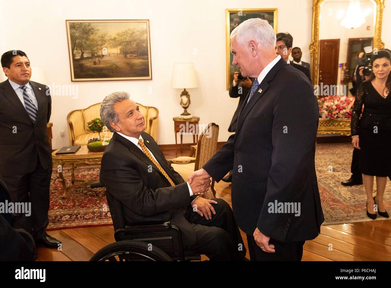 U.S. Vice President Mike Pence, right, shakes hands with Ecuador President Lenin Moreno prior to their bilateral meeting at the government palace June 28, 2018 in Quito, Ecuador. Stock Photo