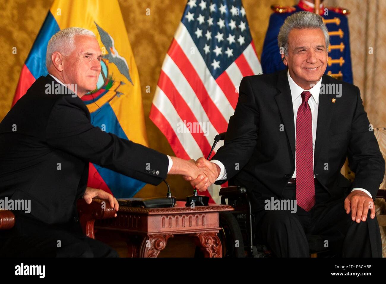 U.S. Vice President Mike Pence, left, shakes hands with Ecuador President Lenin Moreno prior to their bilateral meeting at the government palace June 28, 2018 in Quito, Ecuador. Stock Photo