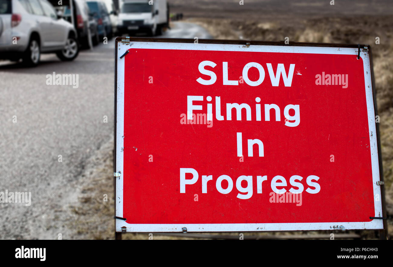 Slow Filming sign, Filming Stock Photo