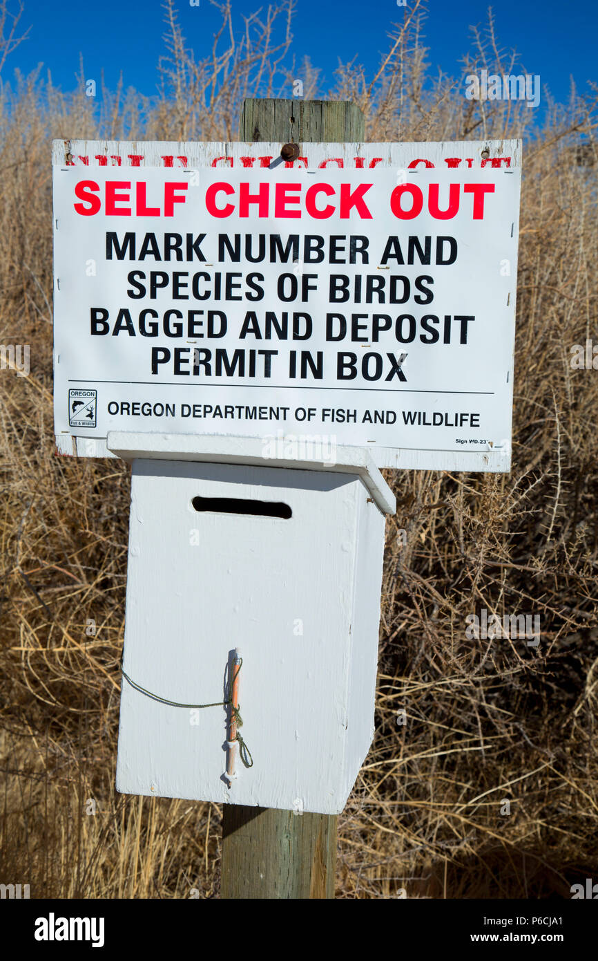 Hunting check-in sign, Summer Lake Wildlife Area, Oregon Outback Scenic Byway, Oregon Stock Photo