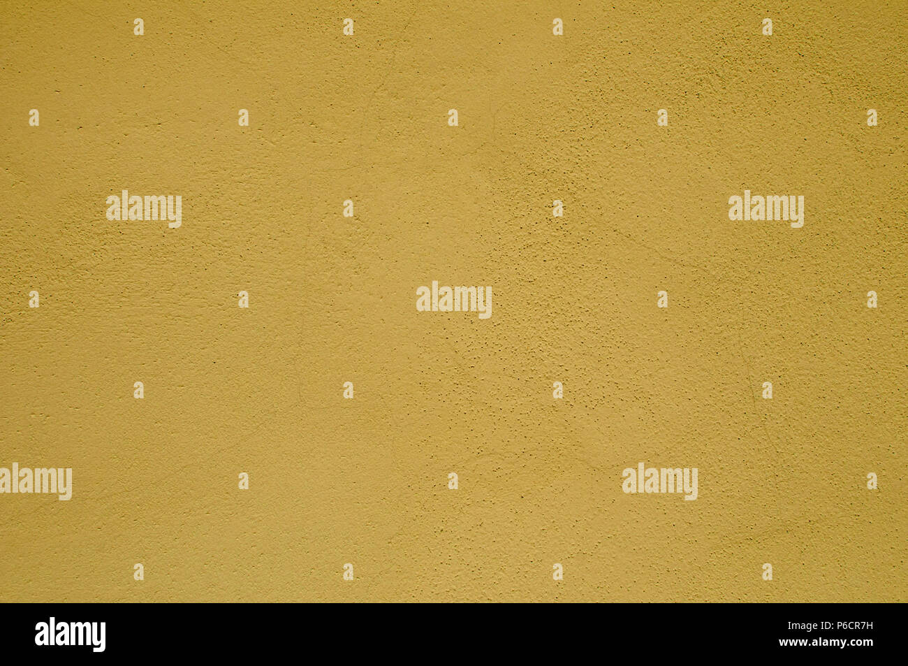 Painted plaster house wall closeup as background Stock Photo