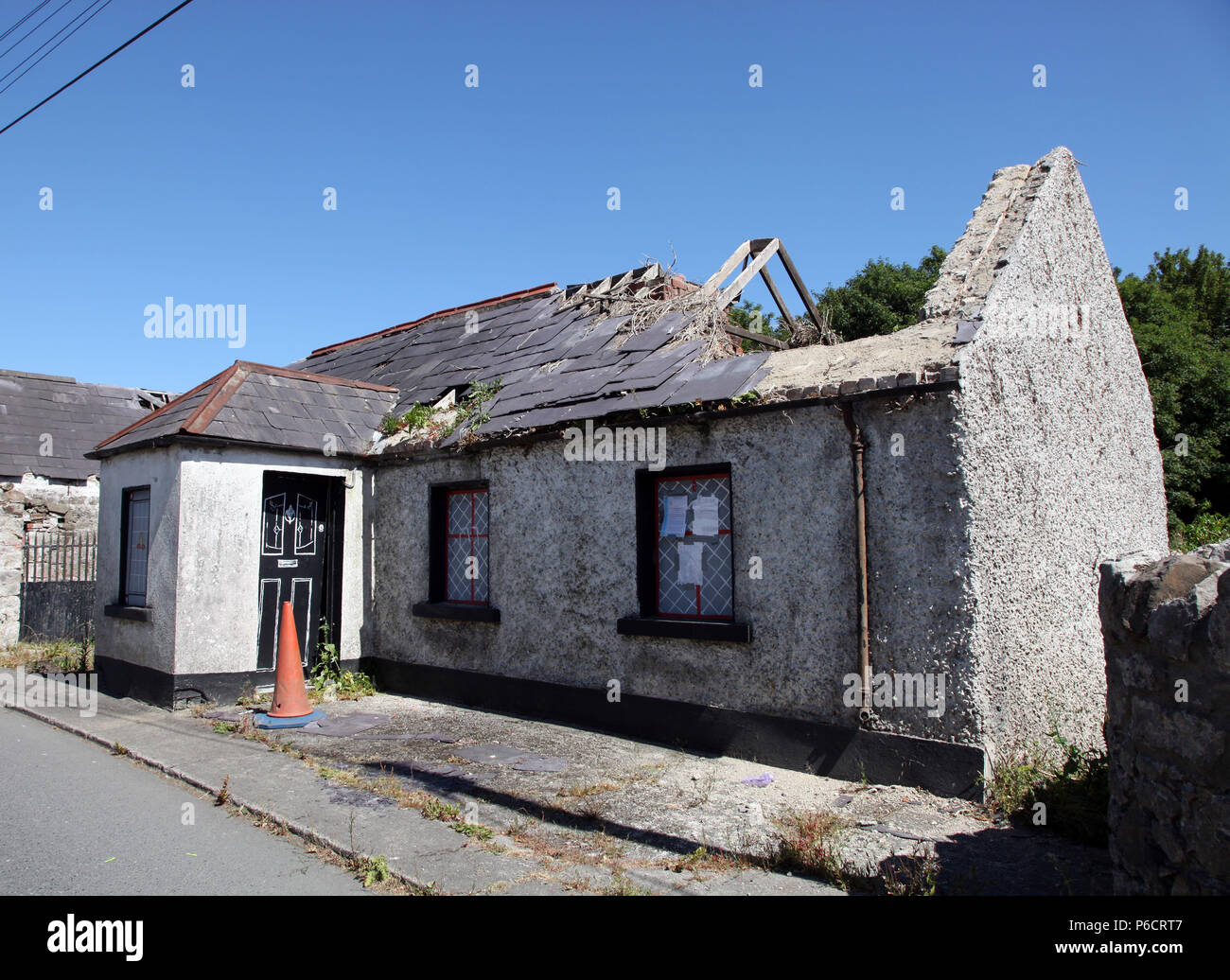 Derelict cottage due for demolition in Carrickmacross, County Monaghan, Ireland Stock Photo