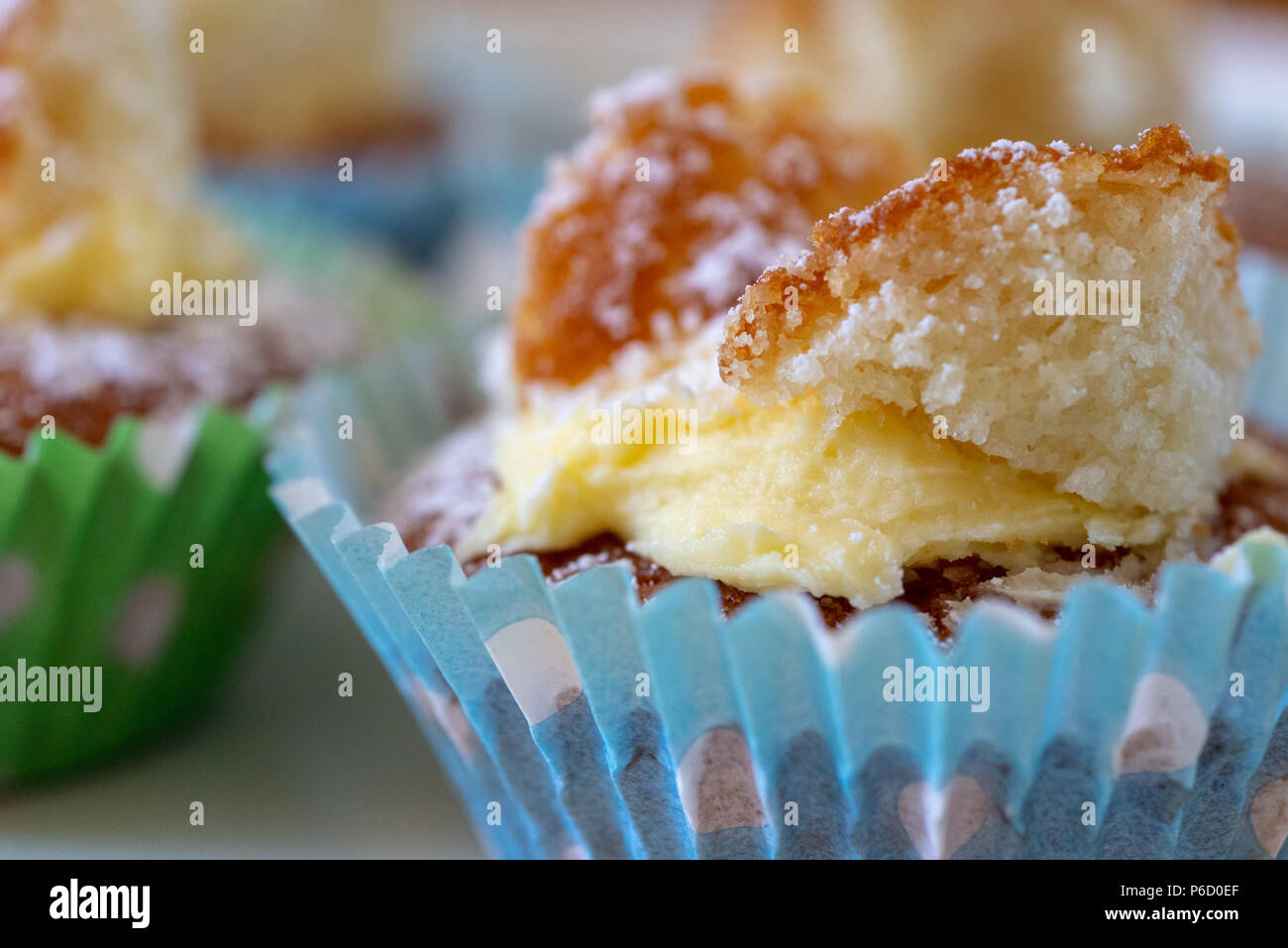Butterfly bun cupcakes in blue and green paper cake cups Stock Photo ...
