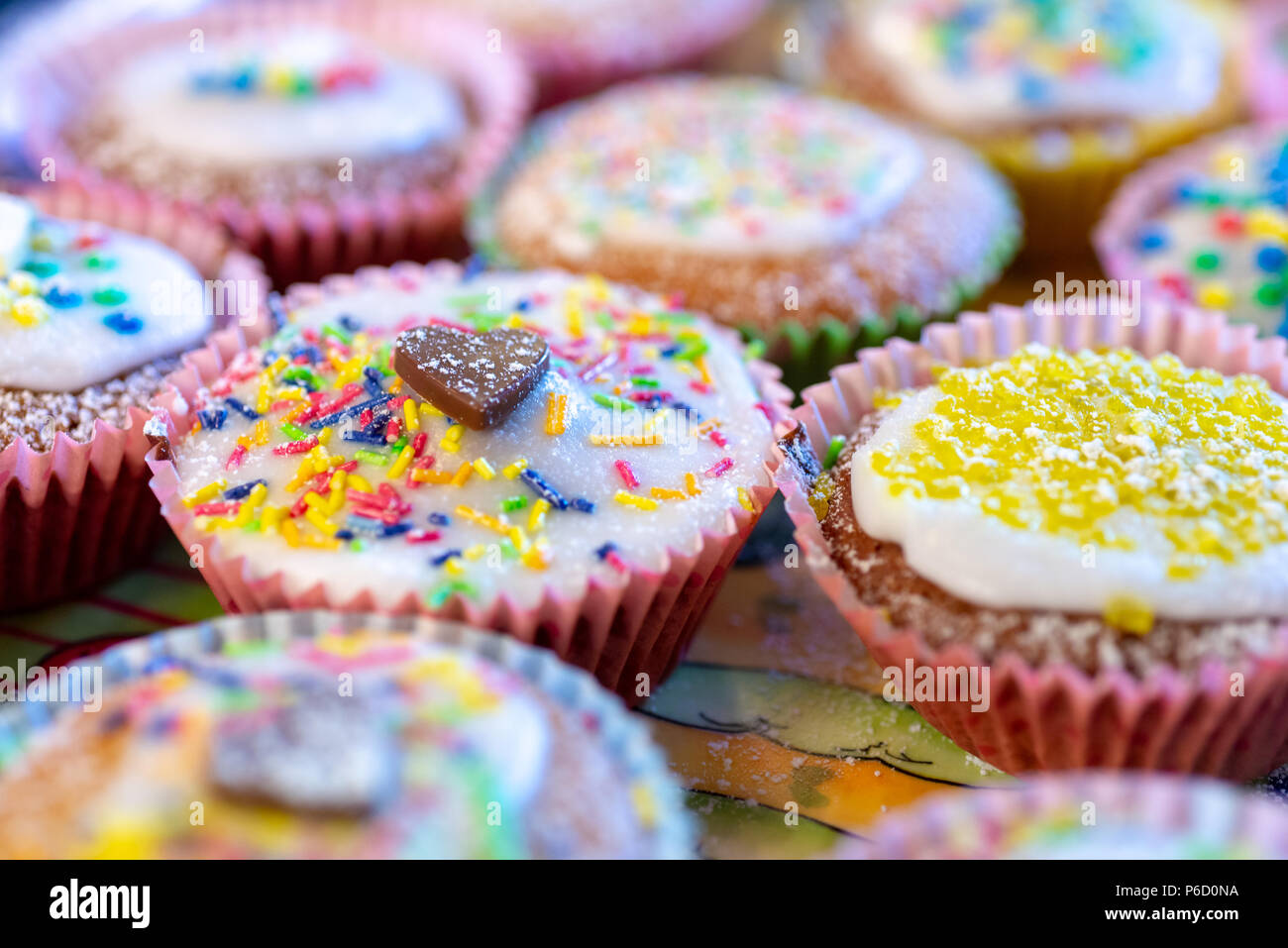 Assorted decorated cup cakes Stock Photo