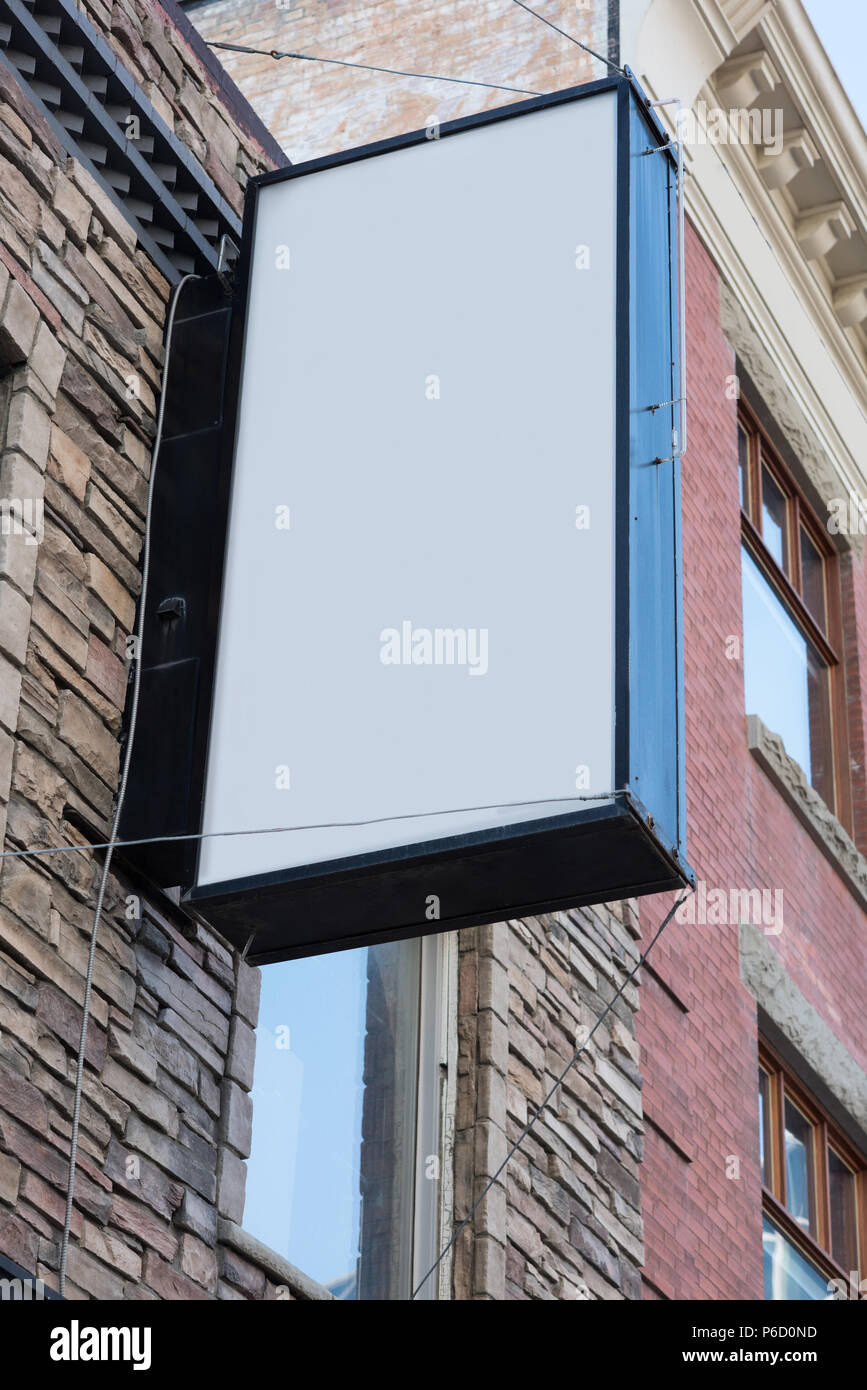 Low angle blank advertisement board near street Stock Photo