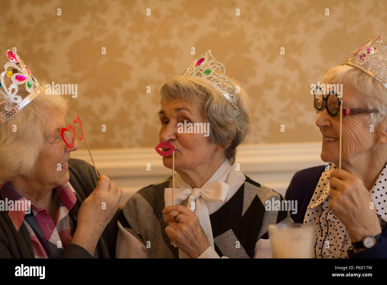 Senior friends having fun at home Stock Photo