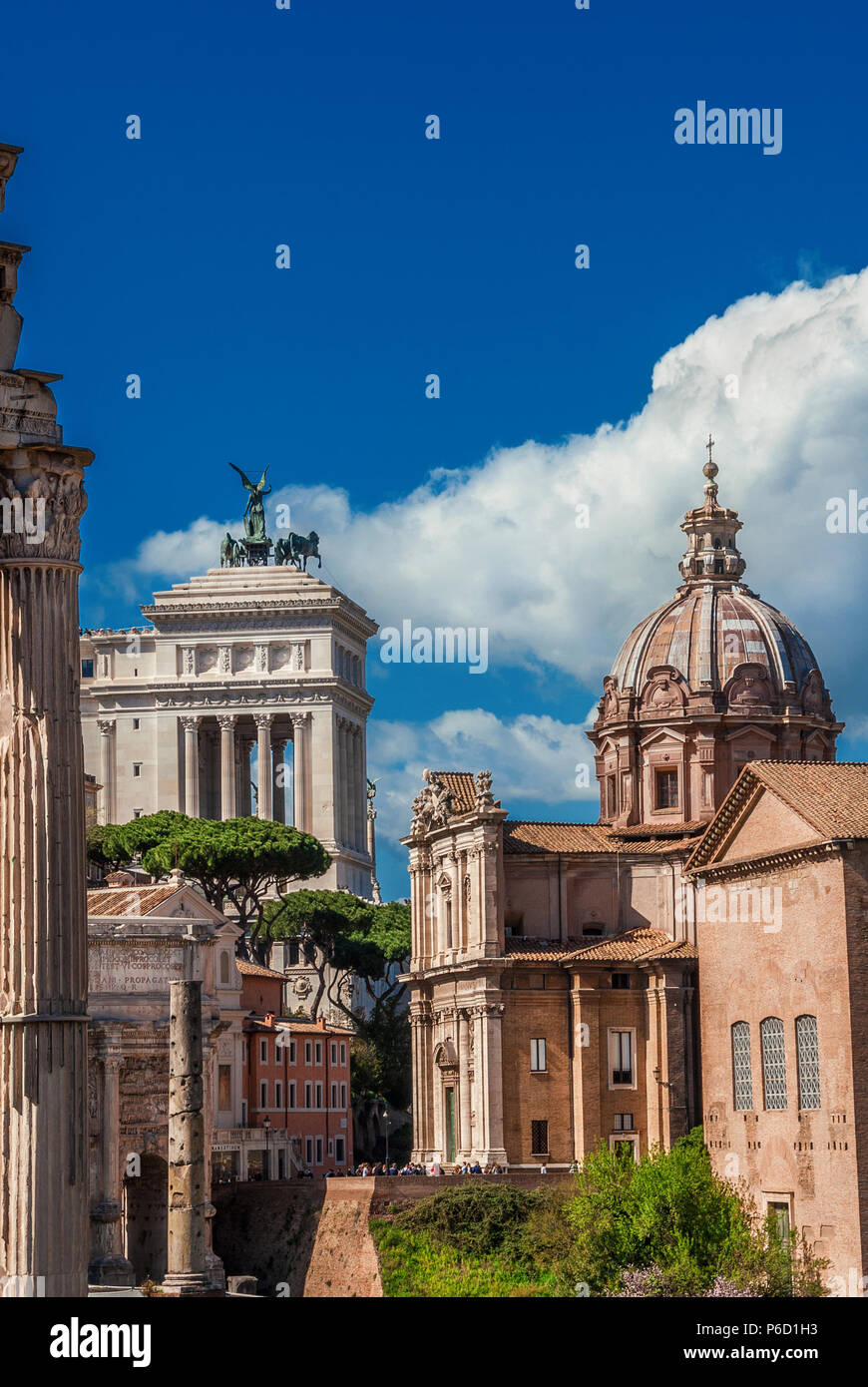 Ancient ruins, classical monuments and baroque church in the historic center of Rome (with copy space above) Stock Photo