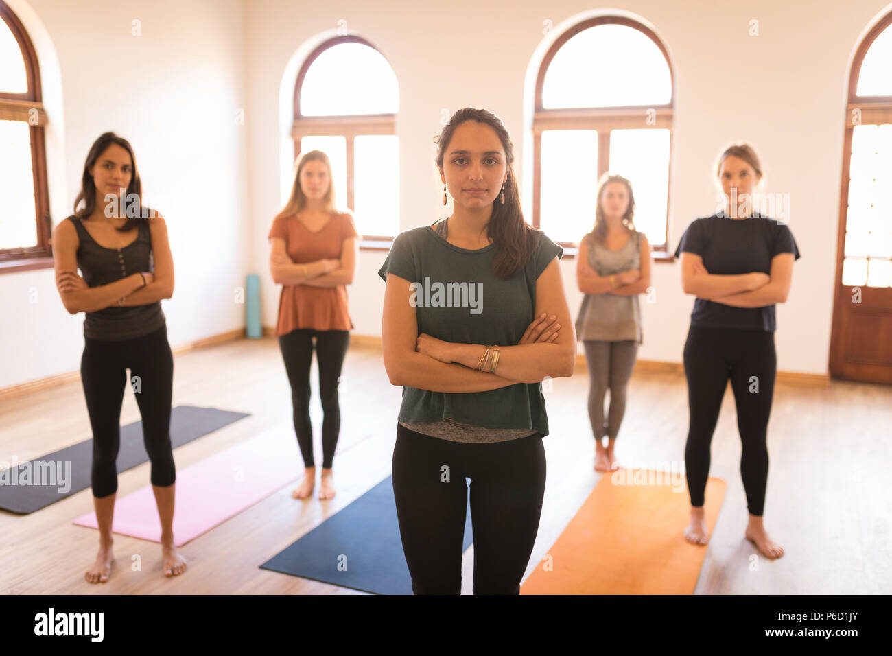 Female coach arms crossed hi-res stock photography and images - Alamy