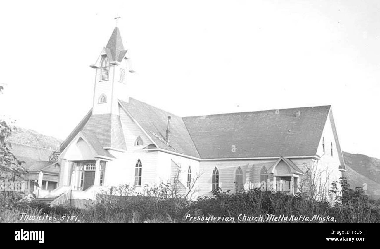 . English: Presbyterian Church, Metlakatla, early 1920s . English: Caption on image: Presbyterian Church, Metlakatla, Alaska PH Coll 247.856 Metlakatla is located at Port Chester on the west coast of Annette Island, 15 miles south of Ketchikan. Metlakatla means 'saltwater channel passage' and was founded by a group of Canadian Tsimshians who migrated from Prince Rupert, British Columbia in 1887 seeking religious freedom. They were led by a Scottish lay priest in the Anglican Church (Church of England), Reverend William Duncan, who had begun his missionary work with the Tsimshians at Fort Simps Stock Photo