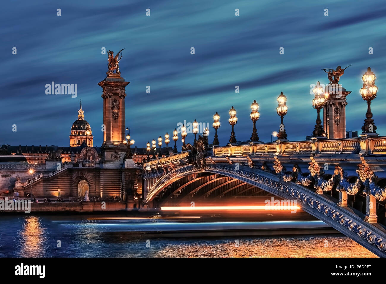 Bridge Alexandre III and Hotel des Invalides in Paris Stock Photo