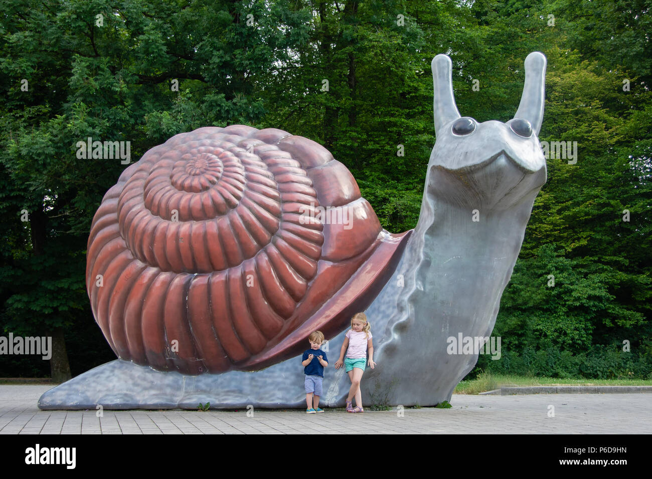 June 21, 2017: The Sweet Brown Snail, the sculpture was designed in 2002 by Jason Rhoades and Paul McCarthy and is located in Munich, Germany Stock Photo