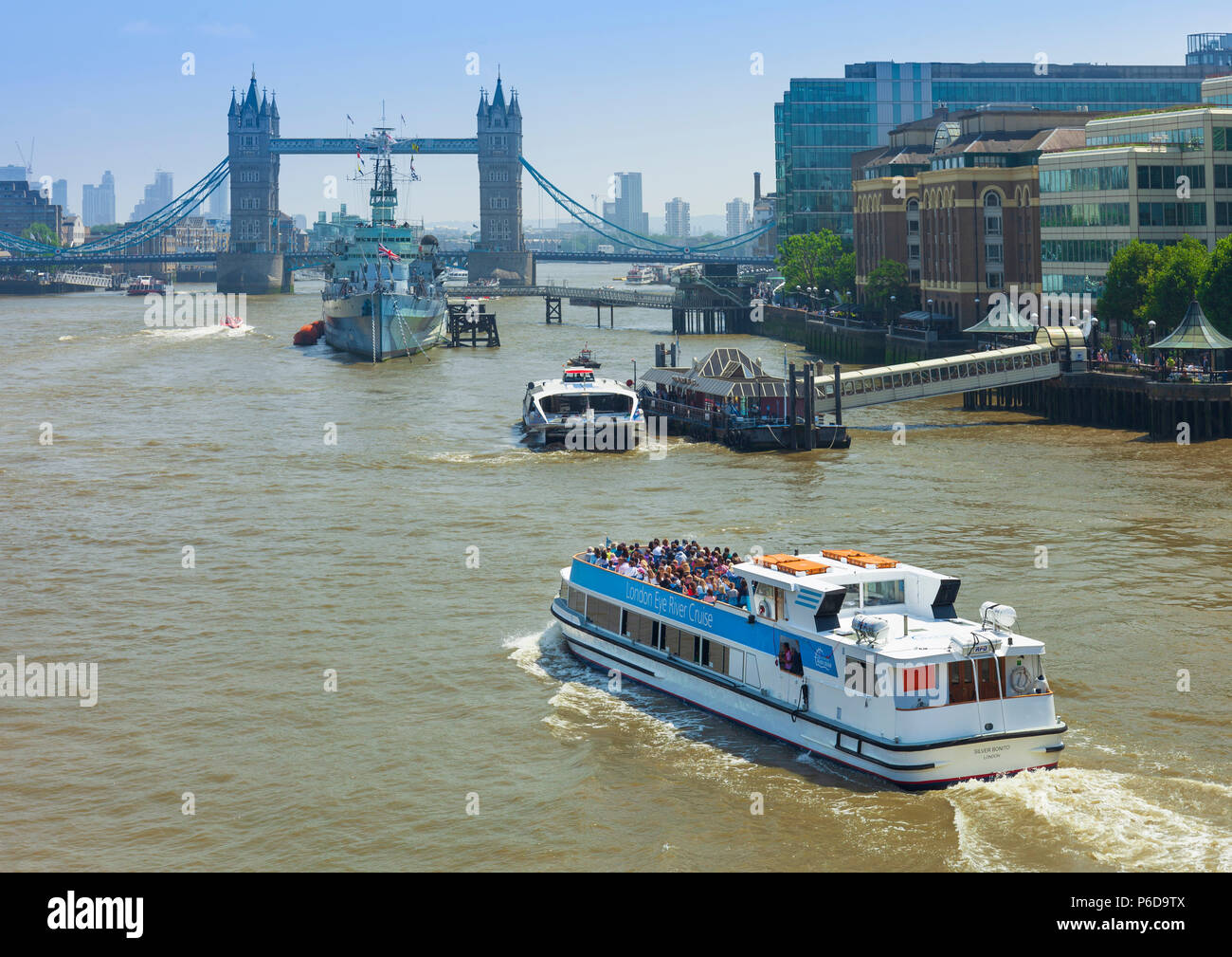 London eye river cruise boat on the river Thames approaching Tower bridge Stock Photo - Alamy